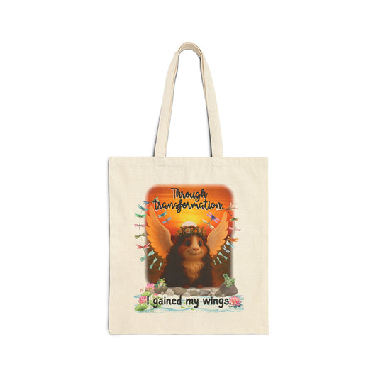 Through Transformation – Winged Guinea Pig Tote 🌅🐾✨
