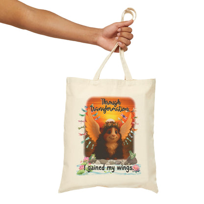 Through Transformation – Winged Guinea Pig Tote 🌅🐾✨