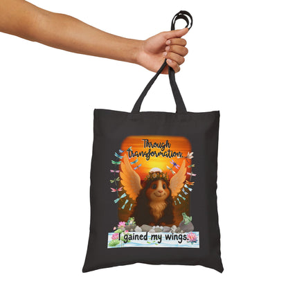 Through Transformation – Winged Guinea Pig Tote 🌅🐾✨
